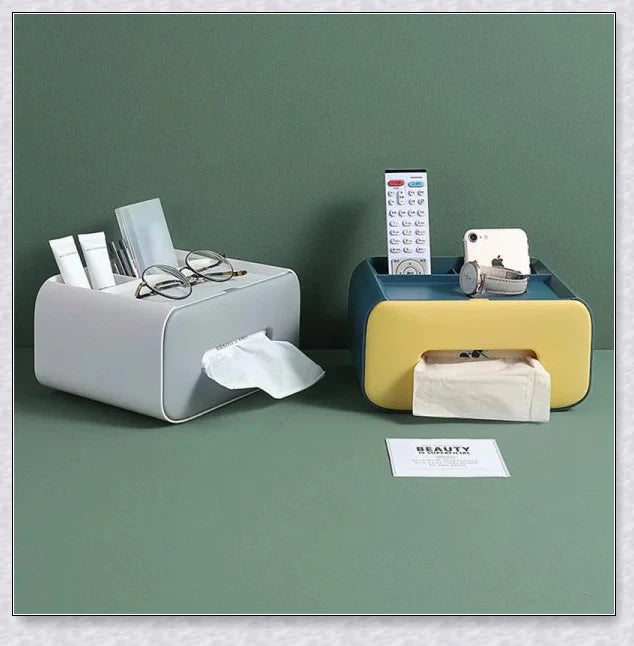 A Nordic-inspired tissue box with multiple storage compartments for organising everyday items like tissues, remote controls, and makeup