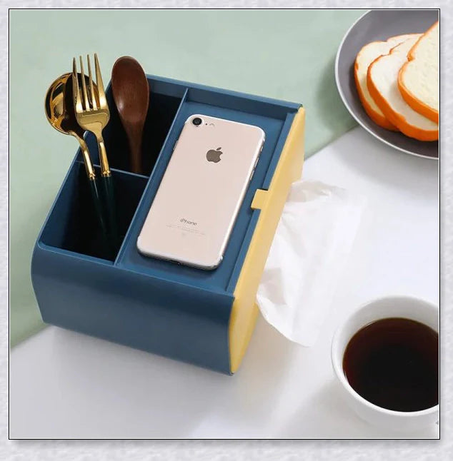 A Nordic-inspired tissue box with multiple storage compartments for organising everyday items like tissues, remote controls, and makeup