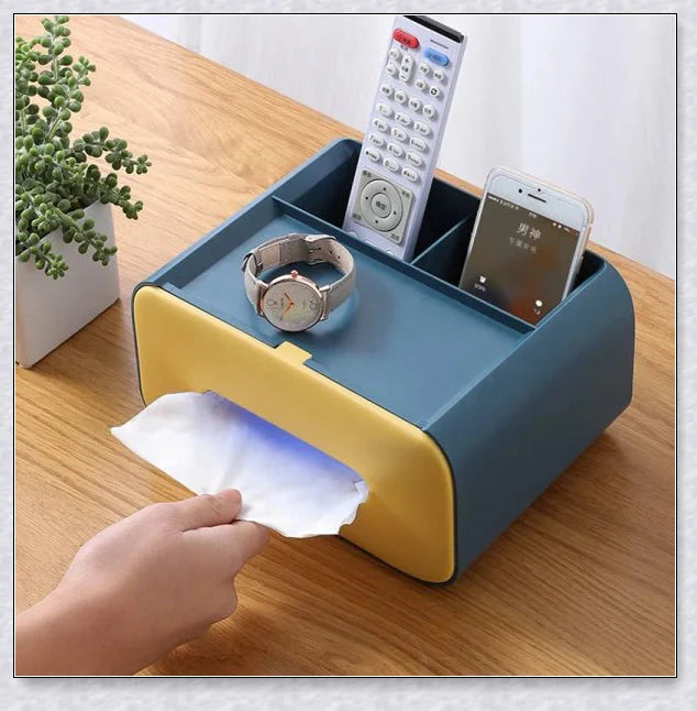 A Nordic-inspired tissue box with multiple storage compartments for organising everyday items like tissues, remote controls, and makeup