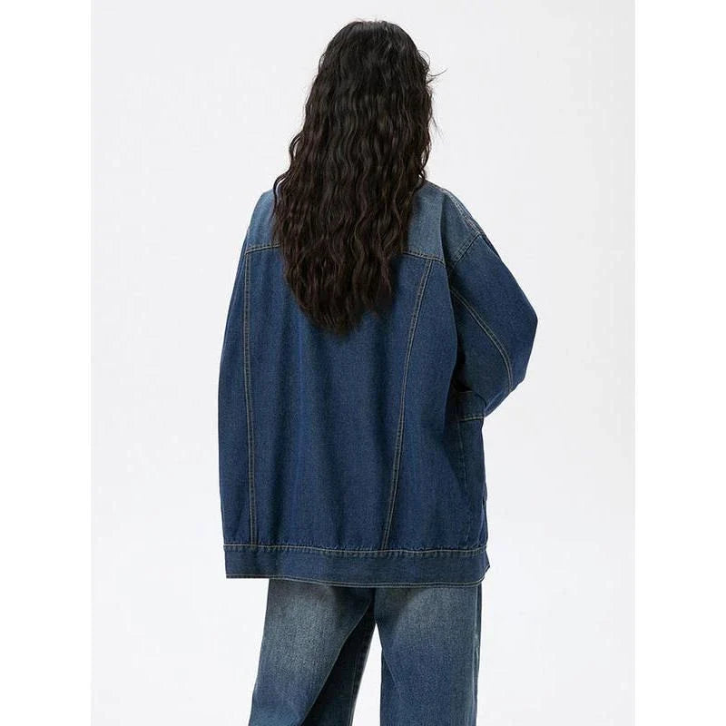 A stylish geometric denim coat with a single-breasted design, perfect for adding a touch of sophistication to your spring wardrobe.