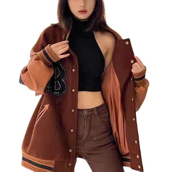 Men's and Women's Loose Minority Design Coat in black, featuring a sophisticated colour blocking design and a generously loose fit for elevated style.