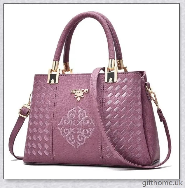 A stylish diagonal handbag made from high-quality PU leather, featuring a spacious interior, adjustable shoulder strap, and organised compartments.