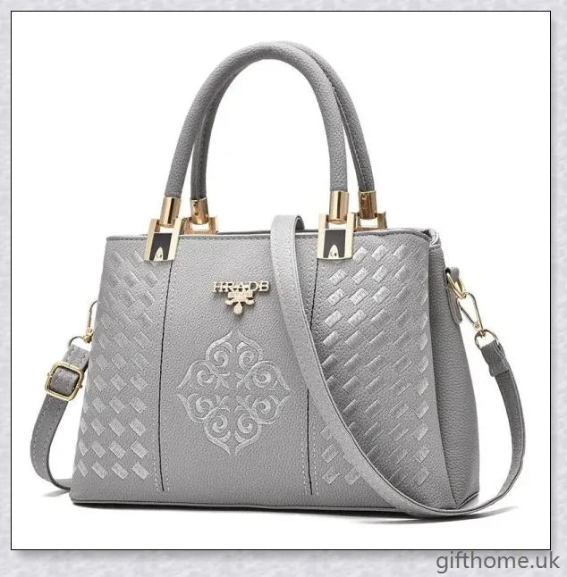 A stylish diagonal handbag made from high-quality PU leather, featuring a spacious interior, adjustable shoulder strap, and organised compartments.