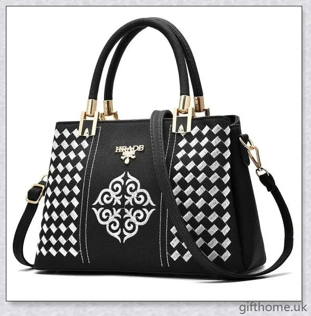 A stylish diagonal handbag made from high-quality PU leather, featuring a spacious interior, adjustable shoulder strap, and organised compartments.