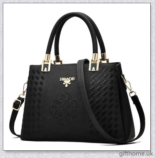 A stylish diagonal handbag made from high-quality PU leather, featuring a spacious interior, adjustable shoulder strap, and organised compartments.