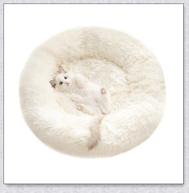 Round and raised cat marshmallow bed in white and grey colours, designed to promote healthy and restful sleep for cats