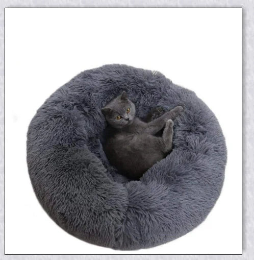 Round and raised cat marshmallow bed in white and grey colours, designed to promote healthy and restful sleep for cats