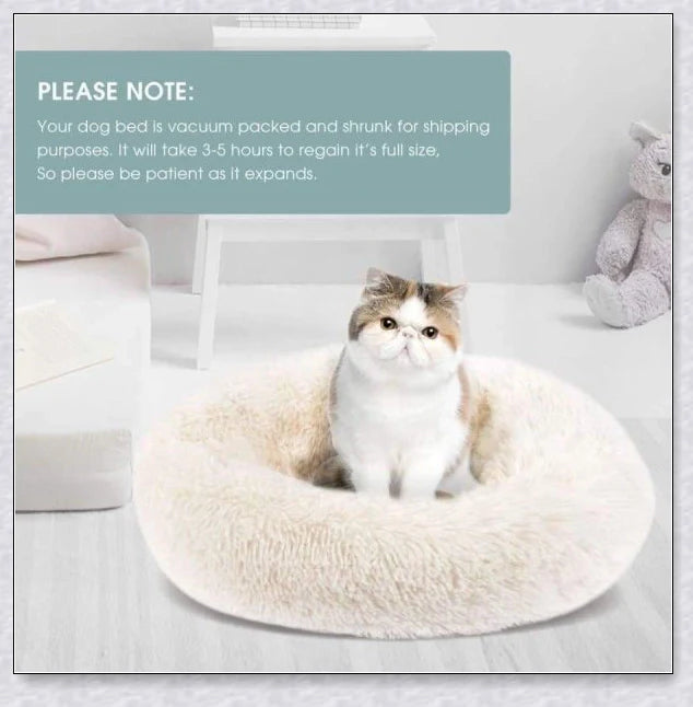 Round and raised cat marshmallow bed in white and grey colours, designed to promote healthy and restful sleep for cats