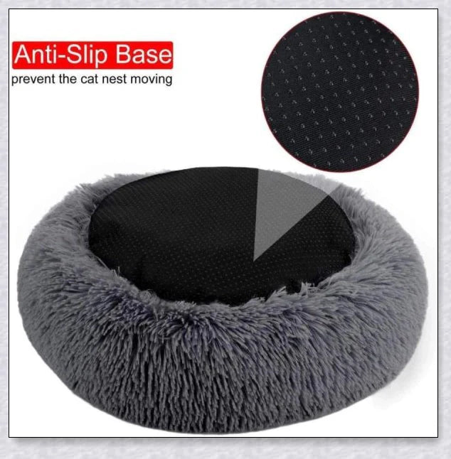 Round and raised cat marshmallow bed in white and grey colours, designed to promote healthy and restful sleep for cats