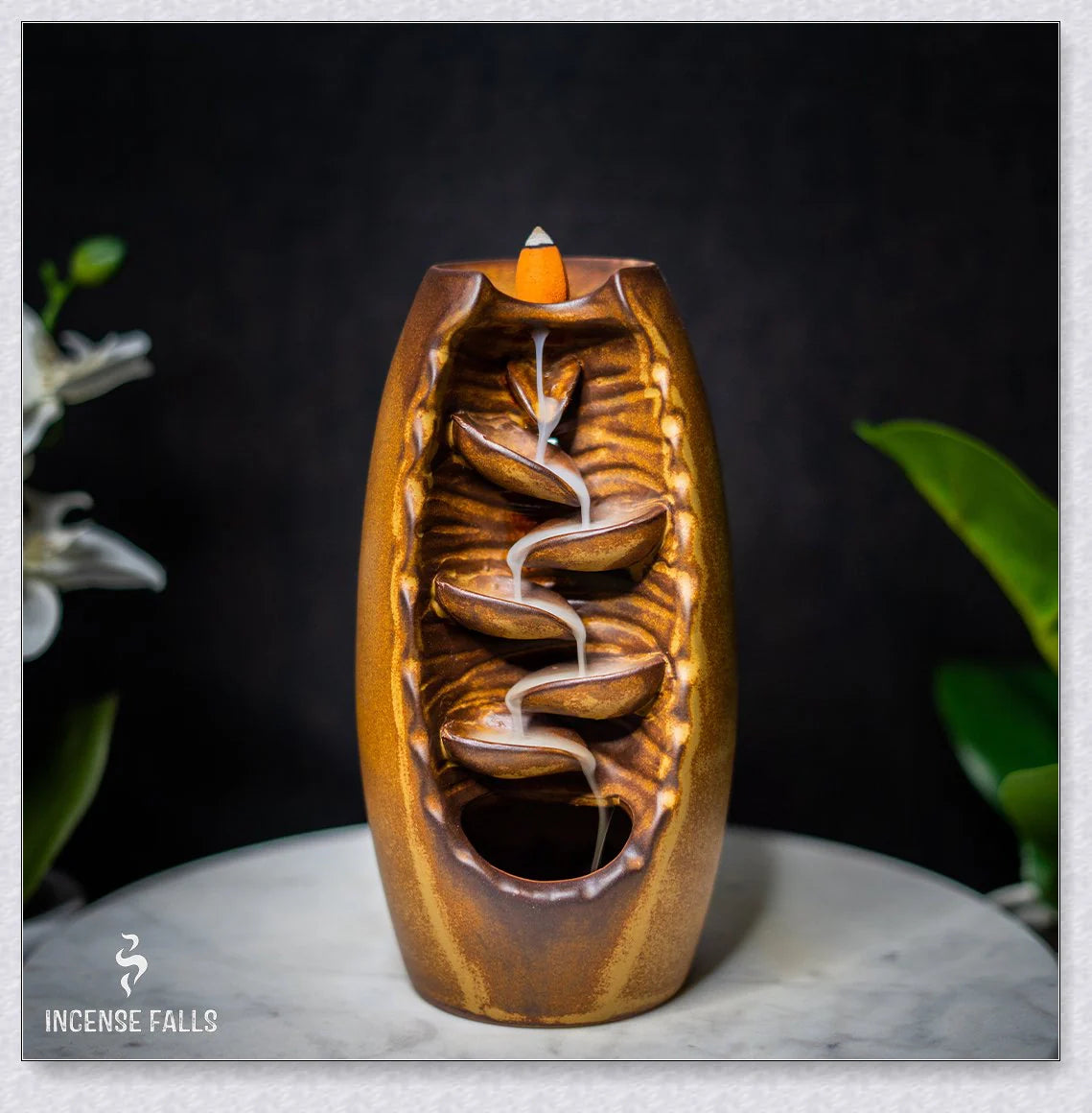 Incense Falls incense burner with mesmerising smoke cascade effect, delivering a calming and rejuvenating aromatherapy experience