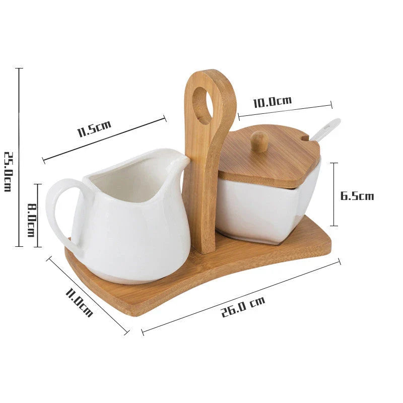 A set of elegant white ceramic sugar and milk pots for serving coffee with sophistication