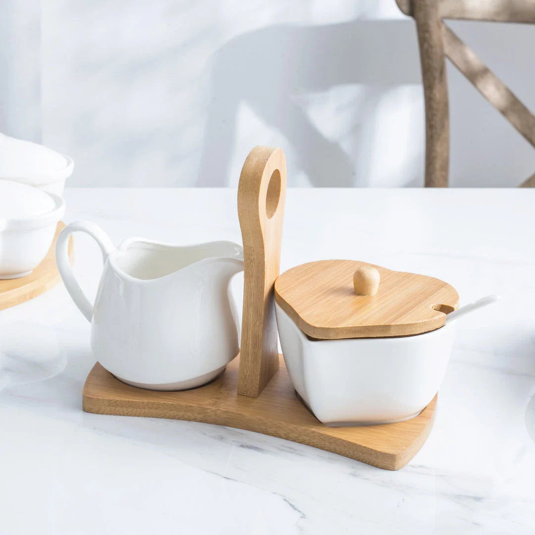 A set of elegant white ceramic sugar and milk pots for serving coffee with sophistication