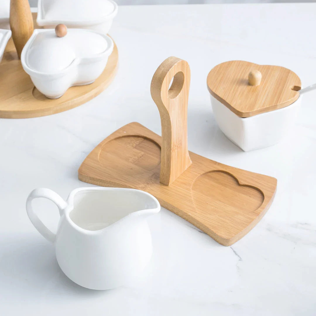 A set of elegant white ceramic sugar and milk pots for serving coffee with sophistication