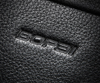 A high-quality genuine leather backpack with a sleek, sophisticated design, perfect for the discerning gentleman