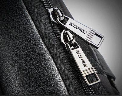 A high-quality genuine leather backpack with a sleek, sophisticated design, perfect for the discerning gentleman