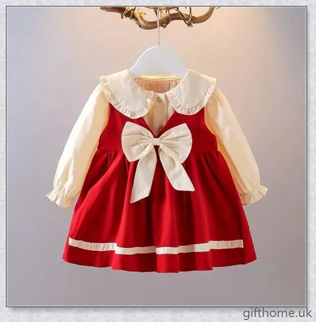 A cosy and stylish autumn lace Christmas dress for baby girls, available in a range of festive colours.
