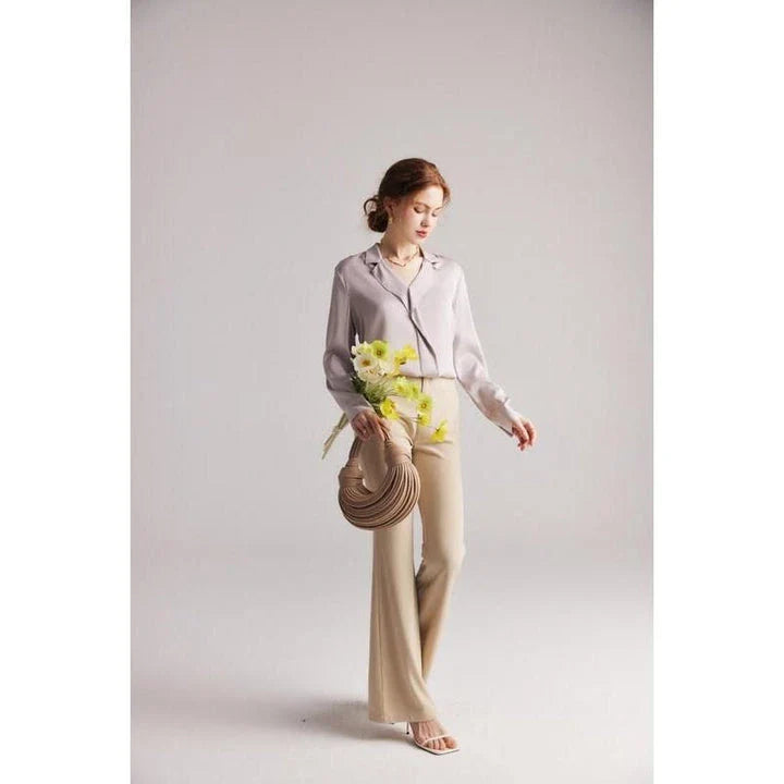 Elegant ruffled v-neck silk blouse in a champagne colour, featuring a straight and regular fit design for a timeless look.