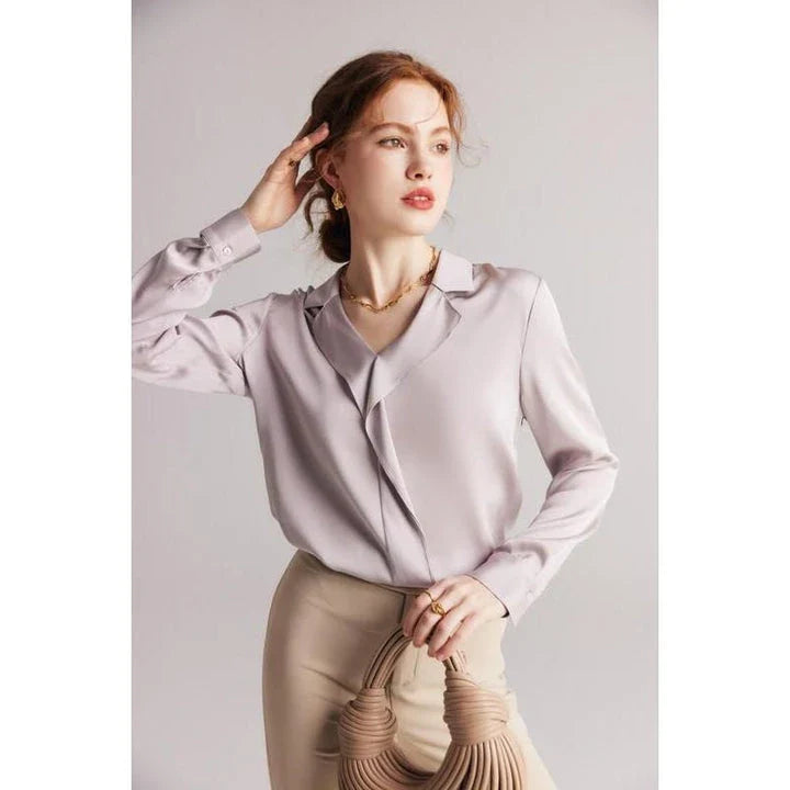Elegant ruffled v-neck silk blouse in a champagne colour, featuring a straight and regular fit design for a timeless look.