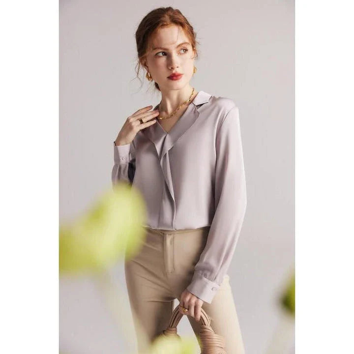 Elegant ruffled v-neck silk blouse in a champagne colour, featuring a straight and regular fit design for a timeless look.