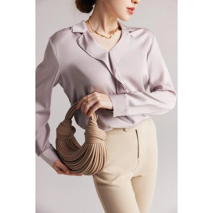Elegant ruffled v-neck silk blouse in a champagne colour, featuring a straight and regular fit design for a timeless look.