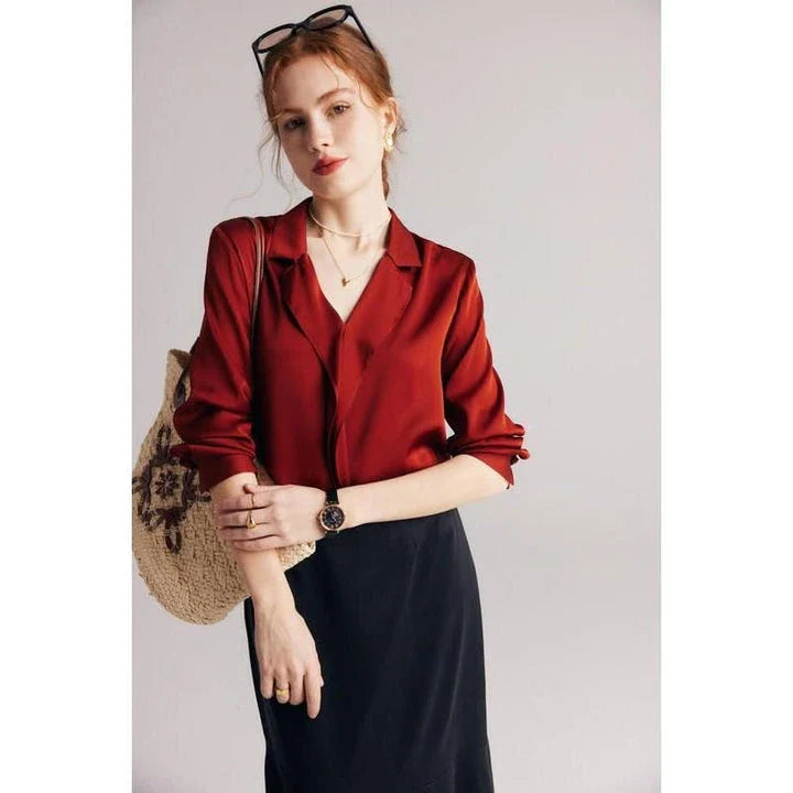 Elegant ruffled v-neck silk blouse in a champagne colour, featuring a straight and regular fit design for a timeless look.