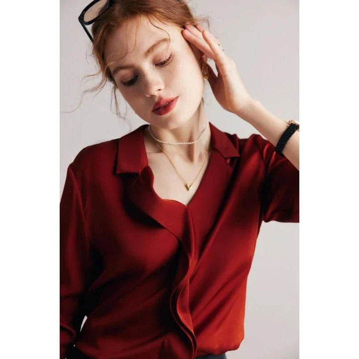 Elegant ruffled v-neck silk blouse in a champagne colour, featuring a straight and regular fit design for a timeless look.