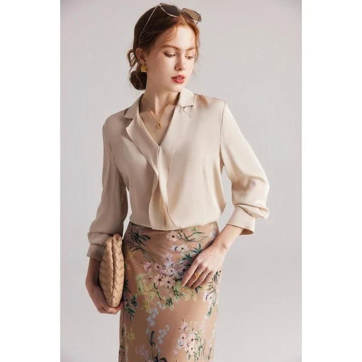 Elegant ruffled v-neck silk blouse in a champagne colour, featuring a straight and regular fit design for a timeless look.