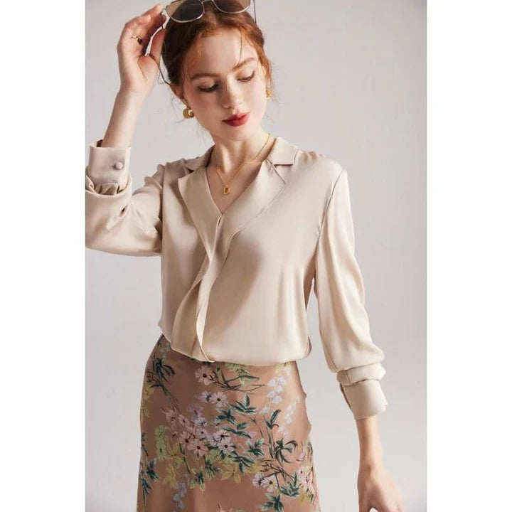 Elegant ruffled v-neck silk blouse in a champagne colour, featuring a straight and regular fit design for a timeless look.
