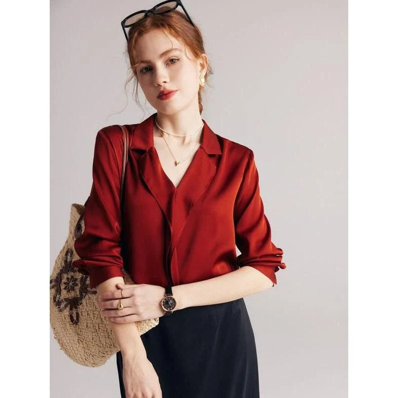 Elegant ruffled v-neck silk blouse in a champagne colour, featuring a straight and regular fit design for a timeless look.