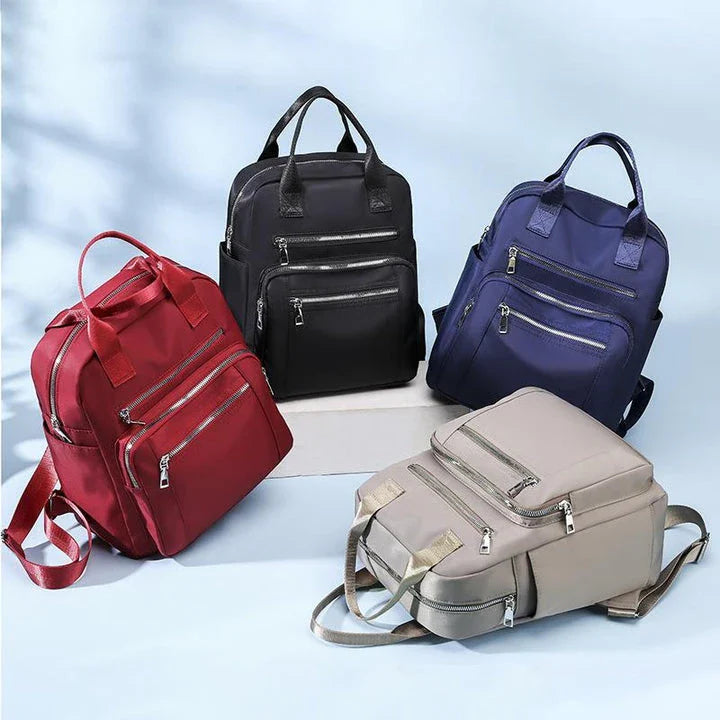New Oxford Cloth Backpack in Dark Blue, a stylish and durable backpack with multiple compartments and a lightweight design