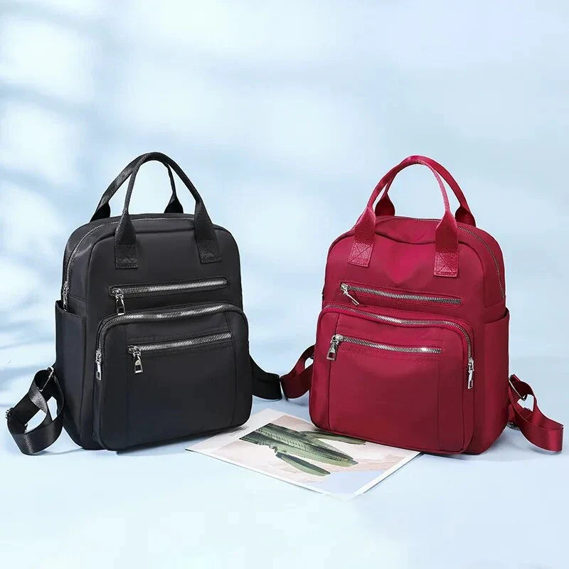 New Oxford Cloth Backpack in Dark Blue, a stylish and durable backpack with multiple compartments and a lightweight design