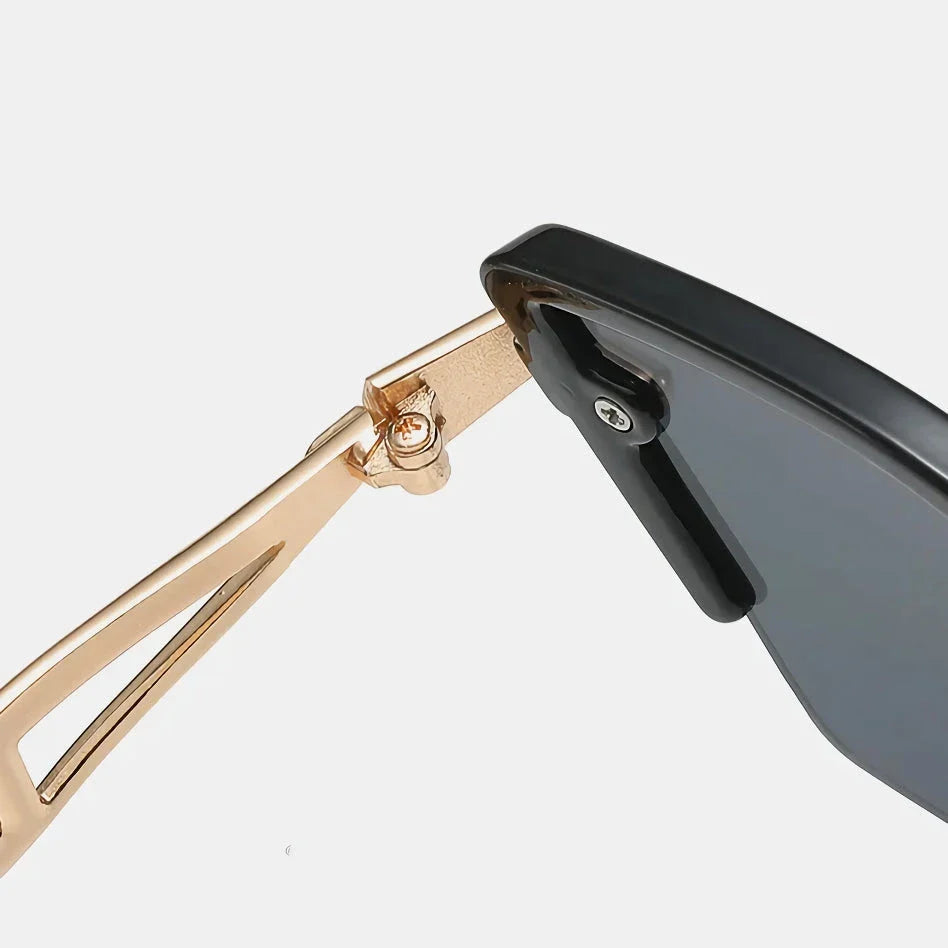Luxury cat eye sunglasses with black frame and gradient lenses, offering UV protection and a stylish, versatile design for women and men.