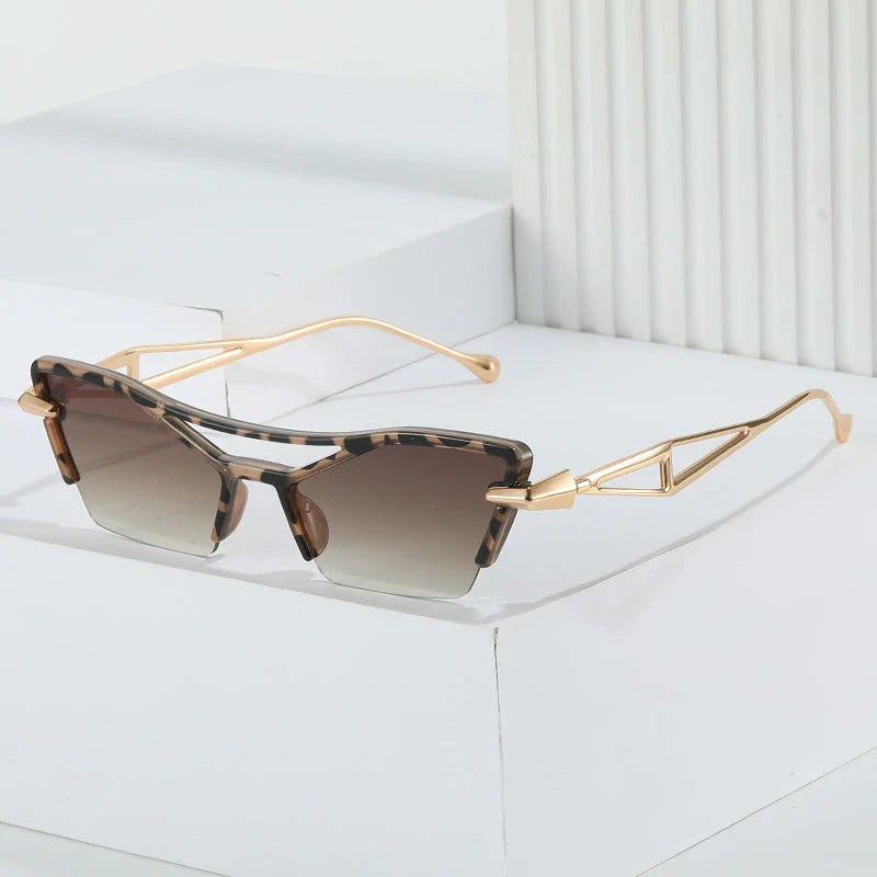 Luxury cat eye sunglasses with black frame and gradient lenses, offering UV protection and a stylish, versatile design for women and men.