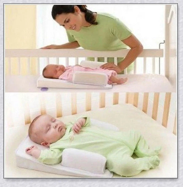 Newborn baby sleep pillow with fixed position and anti-roll support, designed for comfort and breathability
