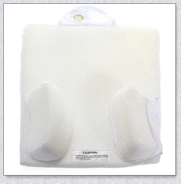 Newborn baby sleep pillow with fixed position and anti-roll support, designed for comfort and breathability