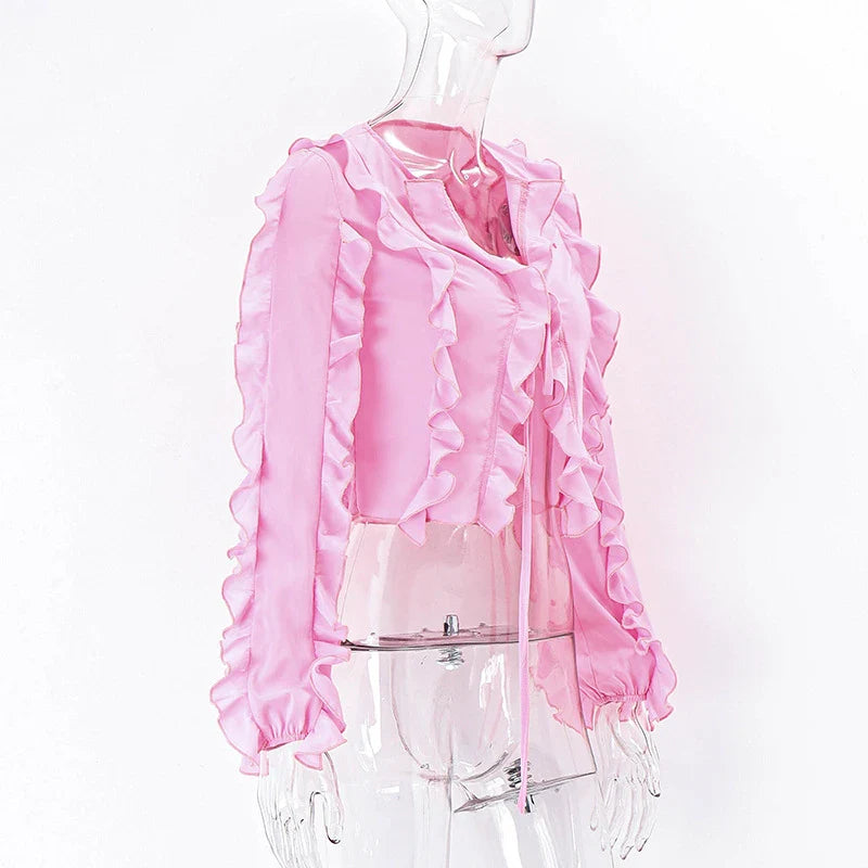 A girls' short top with a v-neck, ruffled trim, and a heart-shaped bow tie, made from stretchy chiffon fabric