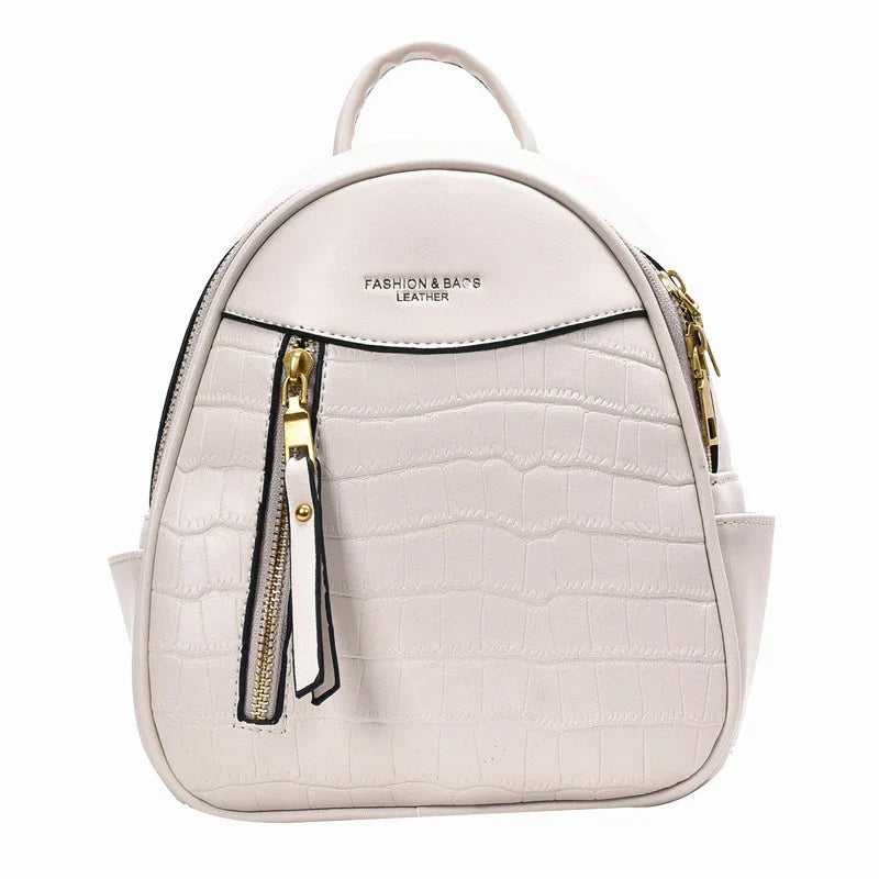 A chic and versatile all-match fashion small backpack in khaki, featuring a spacious square vertical design, premium PU leather construction, and polyester cotton lining for a timeless British-inspired look.