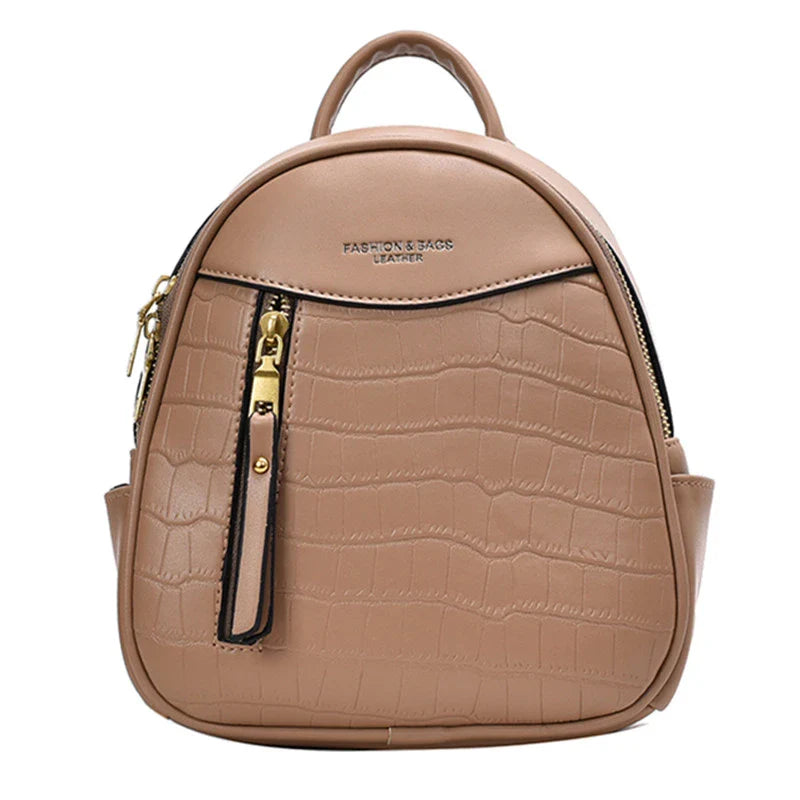A chic and versatile all-match fashion small backpack in khaki, featuring a spacious square vertical design, premium PU leather construction, and polyester cotton lining for a timeless British-inspired look.