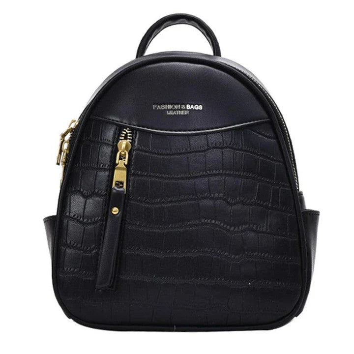 A chic and versatile all-match fashion small backpack in khaki, featuring a spacious square vertical design, premium PU leather construction, and polyester cotton lining for a timeless British-inspired look.