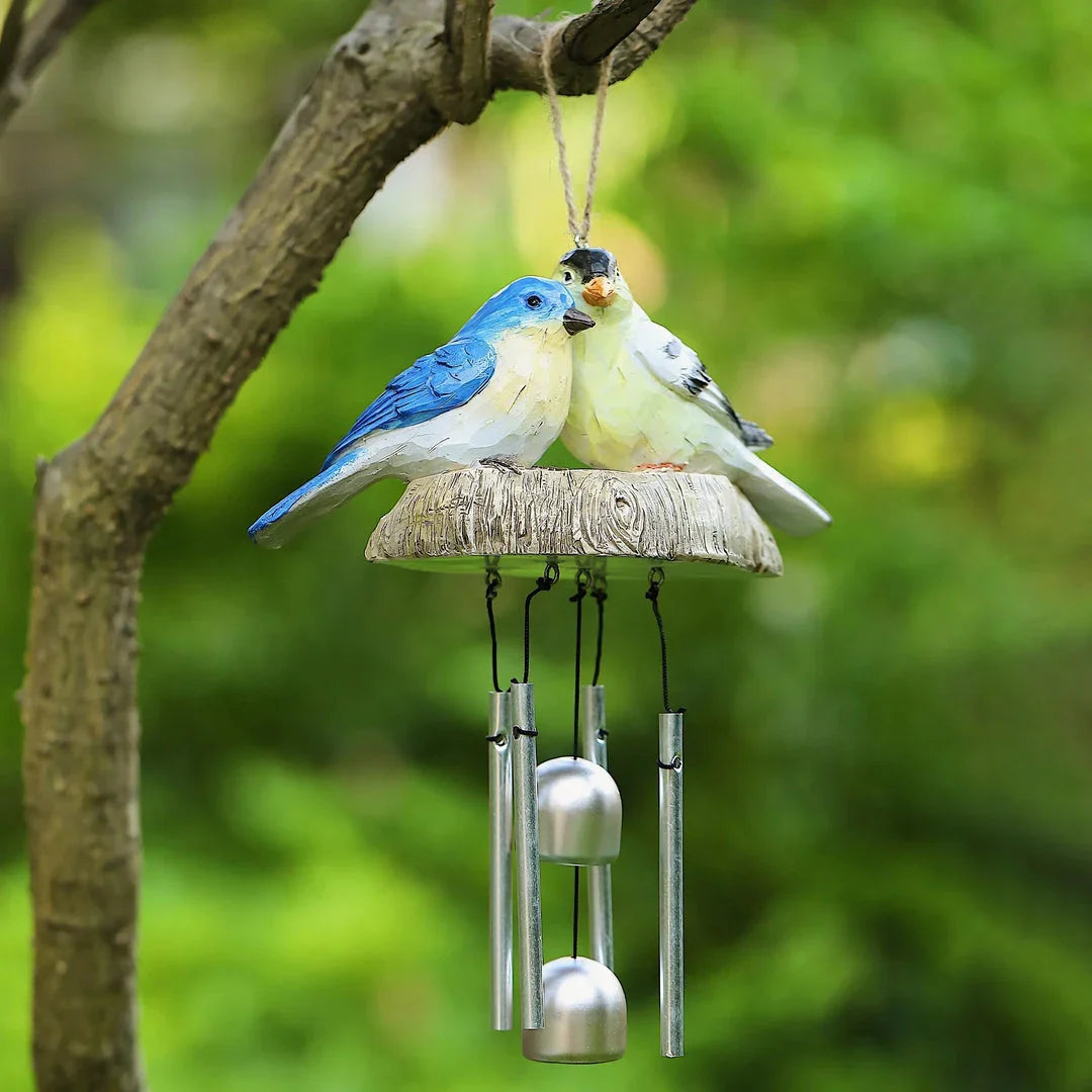 A charming wind chime featuring a beautiful array of resin birds that sways gracefully in the breeze, bringing a serene and whimsical touch to any outdoor or indoor space.