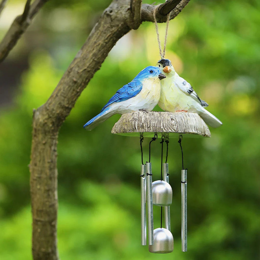 A charming wind chime featuring a beautiful array of resin birds that sways gracefully in the breeze, bringing a serene and whimsical touch to any outdoor or indoor space.