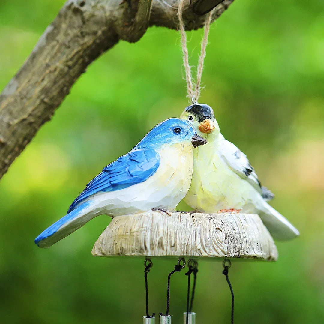 A charming wind chime featuring a beautiful array of resin birds that sways gracefully in the breeze, bringing a serene and whimsical touch to any outdoor or indoor space.