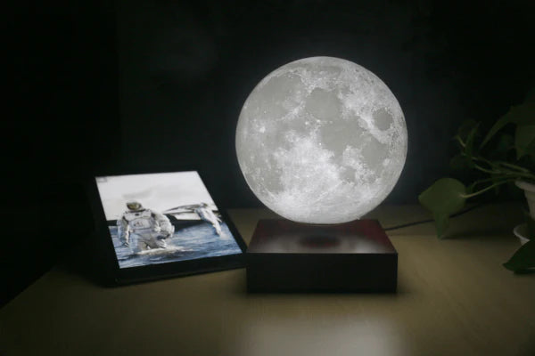 A levitating 3D moon lamp that rotates 360 degrees and has adjustable light settings