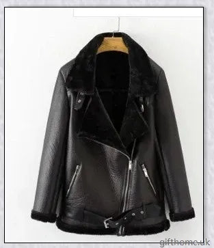 Stylish and cosy artificial fur zipper coat for women, featuring a sleek PU leather exterior and plush lining for exceptional warmth and comfort.