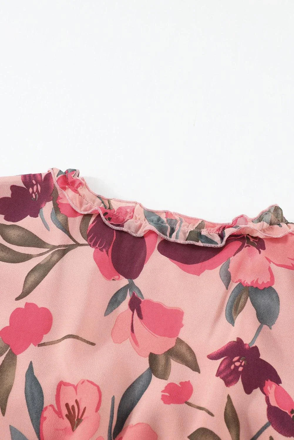 Floral Frill Trim Flounce Sleeve Plunge Maxi Dress from Trendha, featuring a captivating floral print, delicate frill trim, and a flattering flounce sleeve design.