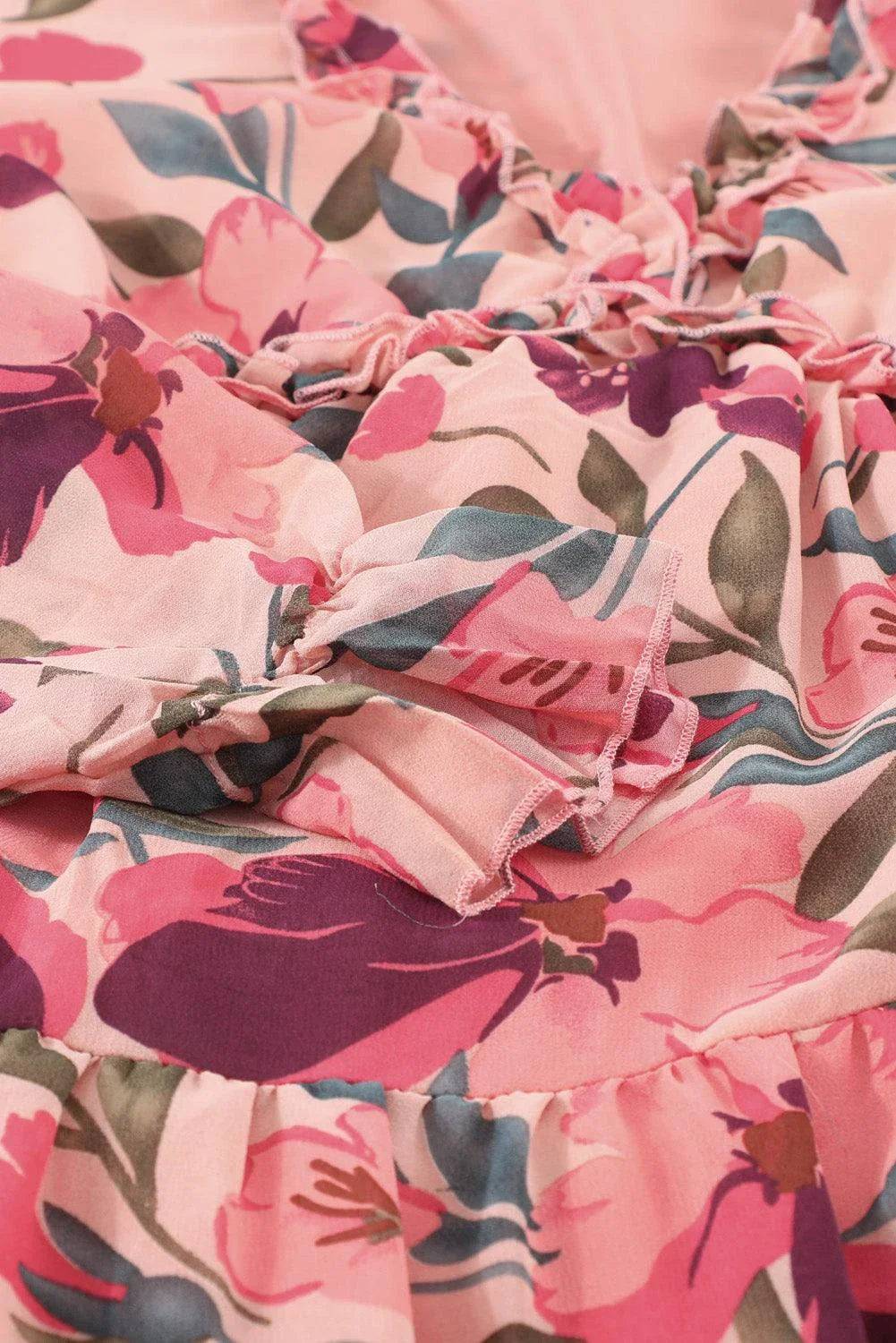 Floral Frill Trim Flounce Sleeve Plunge Maxi Dress from Trendha, featuring a captivating floral print, delicate frill trim, and a flattering flounce sleeve design.