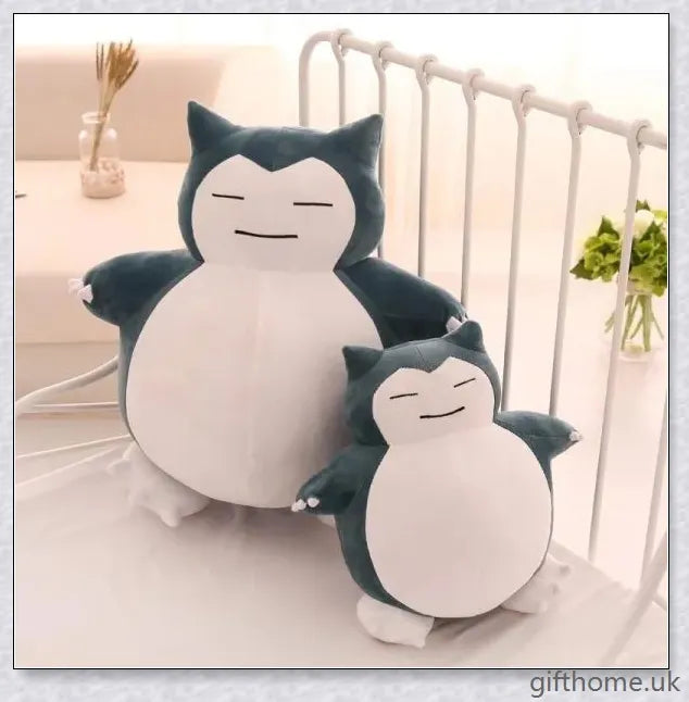 A soft, cuddly Snorlax anime plush toy in various sizes, a perfect Pokémon collectible and gift.