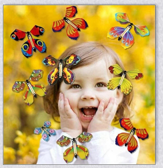 Colourful magic flying butterflies taking flight from a greeting card or book, creating a delightful surprise