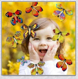 Colourful magic flying butterflies taking flight from a greeting card or book, creating a delightful surprise