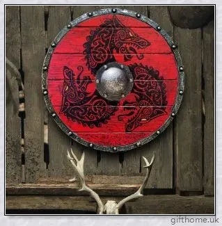 Authentic battle-worn Viking shield with two ravens design and iron spikes, adorned with Celtic buckle and rune characters